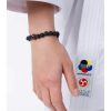 seishin-bracelet-sur-karate-gi-sur-poignet